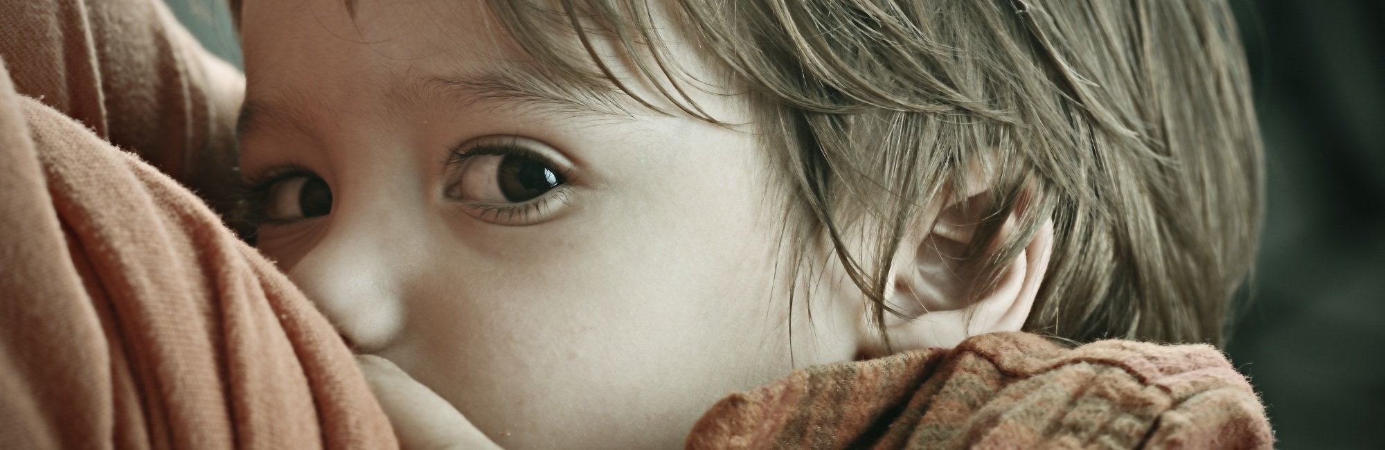 toddler breastfeeding in morning