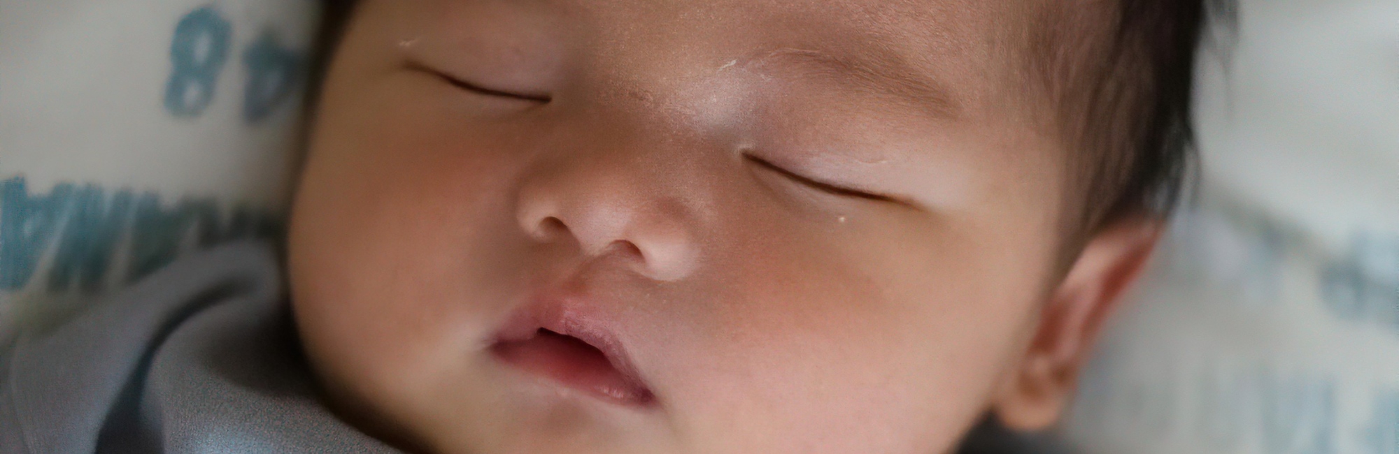 baby sleeping safely on back