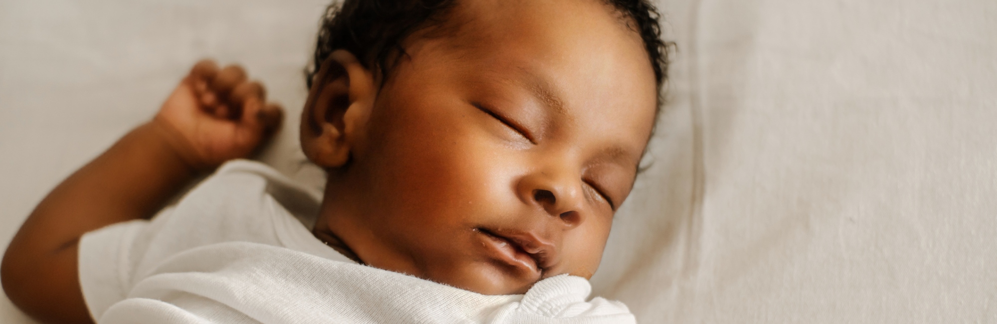baby sleeping on back